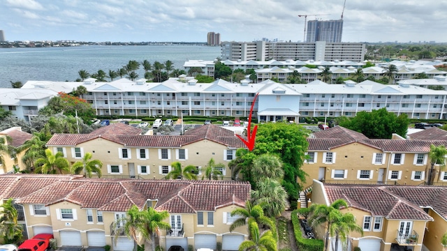 bird's eye view with a water view