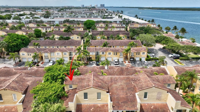 drone / aerial view featuring a water view