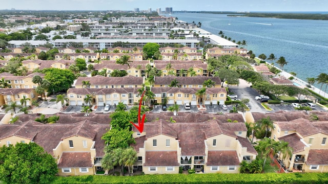 drone / aerial view featuring a water view