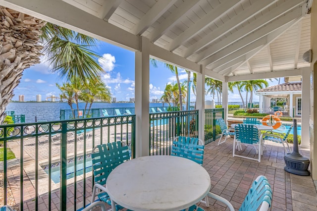 view of patio featuring a water view