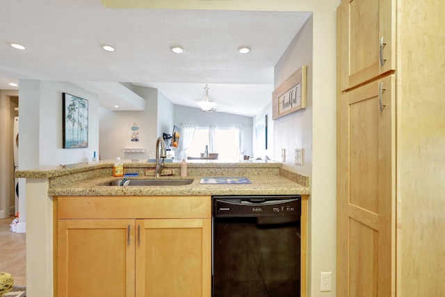 kitchen with sink, black dishwasher, light brown cabinetry, vaulted ceiling, and kitchen peninsula