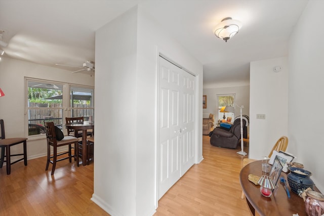 hall with light hardwood / wood-style flooring