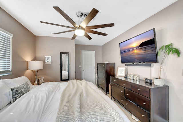 bedroom featuring a closet and ceiling fan