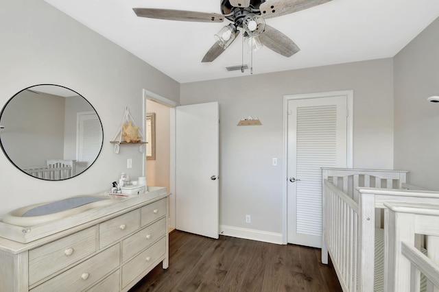 interior space featuring hardwood / wood-style flooring, vanity, and ceiling fan