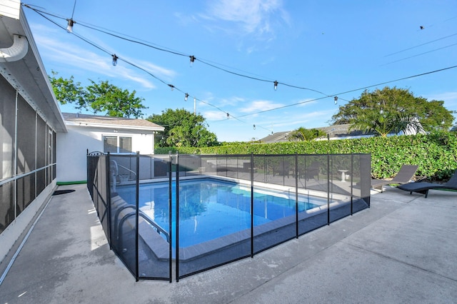 view of pool with a patio