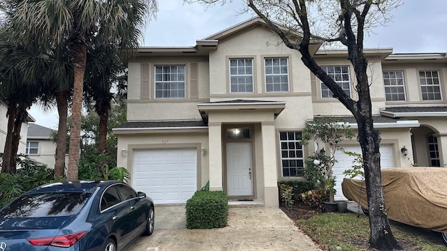 view of front of home with a garage