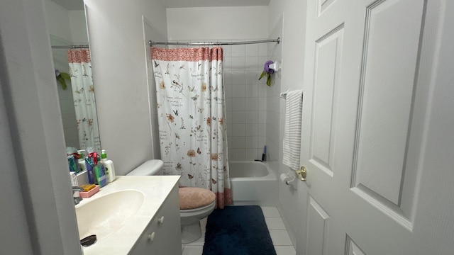 full bathroom featuring tile patterned floors, vanity, toilet, and shower / tub combo with curtain