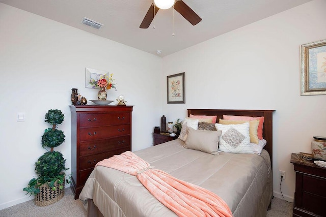 bedroom with light colored carpet and ceiling fan