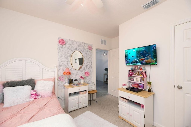 carpeted bedroom featuring ceiling fan