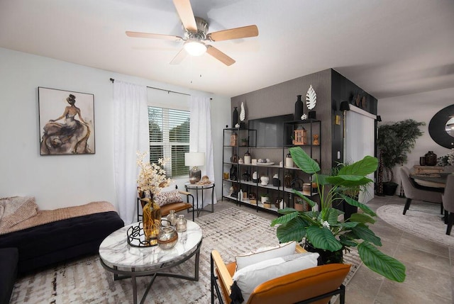 living room with light tile patterned flooring and ceiling fan