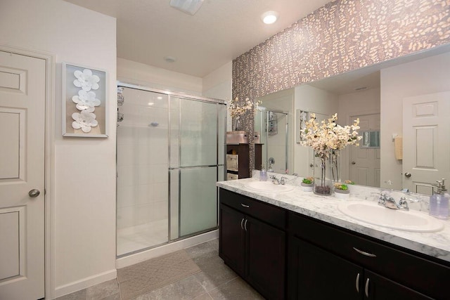 bathroom with vanity and walk in shower