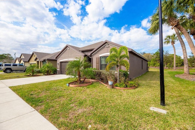 view of front of home featuring a garage and a front yard