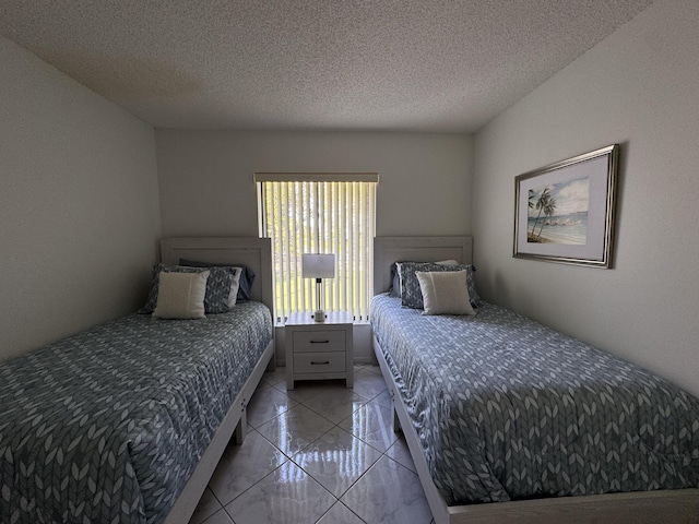 bedroom with a textured ceiling