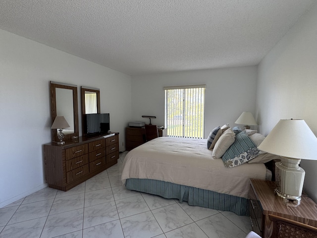 bedroom with a textured ceiling