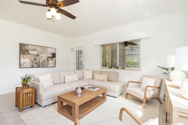 living room featuring a ceiling fan and light tile patterned flooring