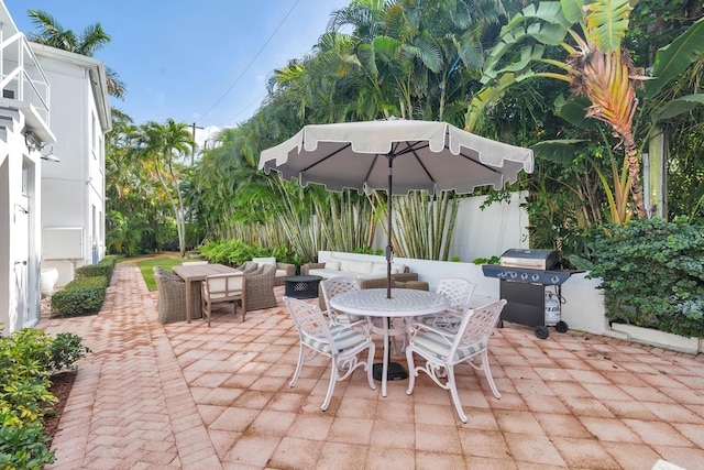 view of patio featuring a grill