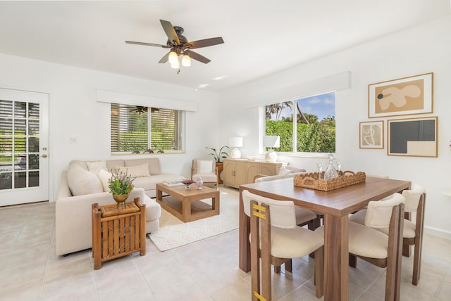 dining room featuring light tile patterned floors and ceiling fan