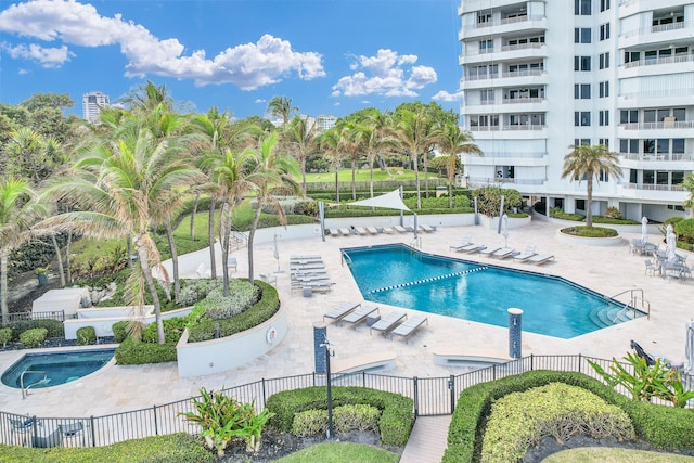 view of swimming pool with a patio