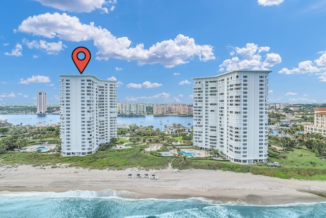 aerial view featuring a water view and a view of the beach