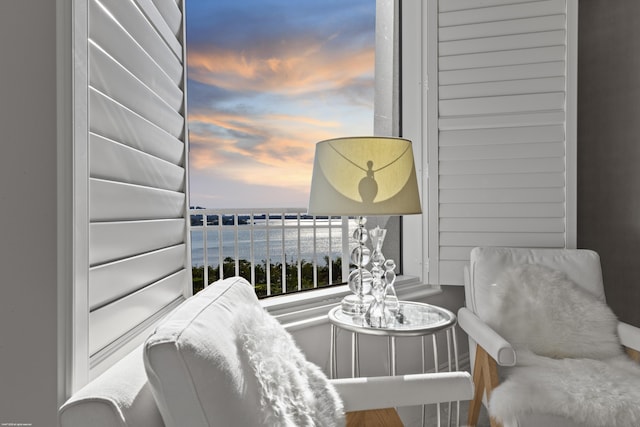 balcony at dusk with a water view