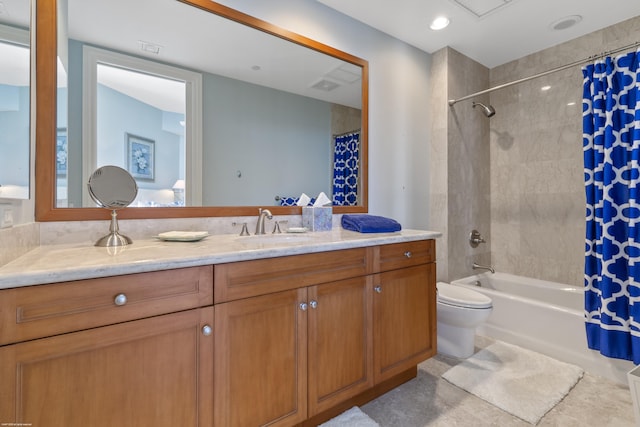 full bathroom featuring vanity, toilet, and shower / bath combo with shower curtain