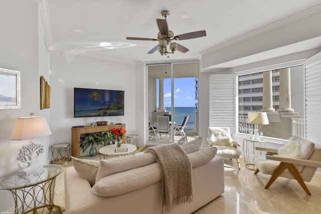 living room with ornamental molding, floor to ceiling windows, and ceiling fan