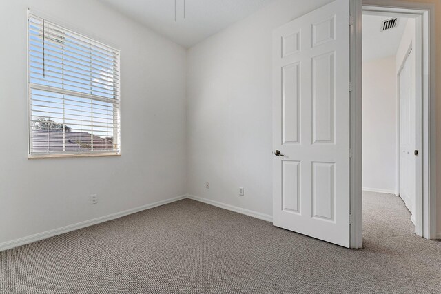 4329 Savannah Bay Pl, Jupiter, FL 33458 - unfurnished bedroom with carpet flooring and baseboards