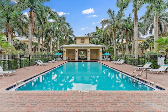 view of swimming pool with a patio