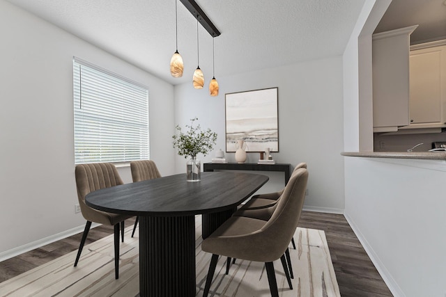 4329 Savannah Bay Pl, Jupiter, FL 33458 - dining area featuring wood finished floors, baseboards, and a textured ceiling