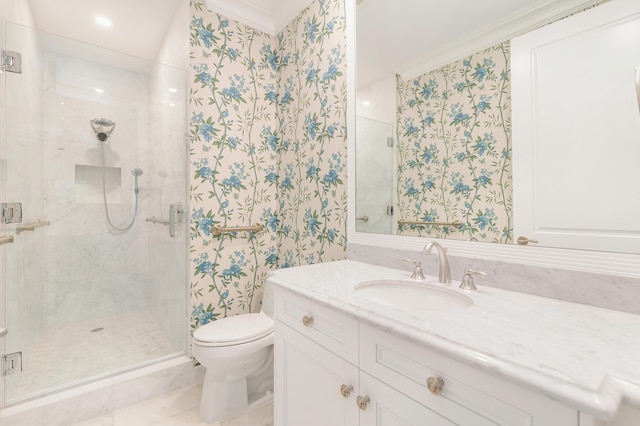 bathroom featuring tile patterned floors, toilet, crown molding, vanity, and a shower with door