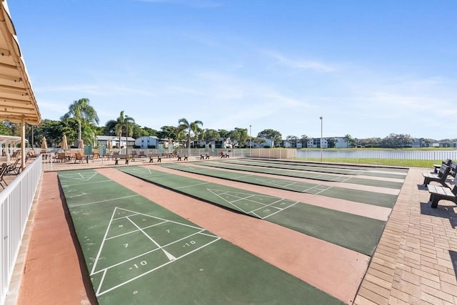 view of home's community with a water view