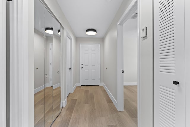 hall featuring light hardwood / wood-style flooring