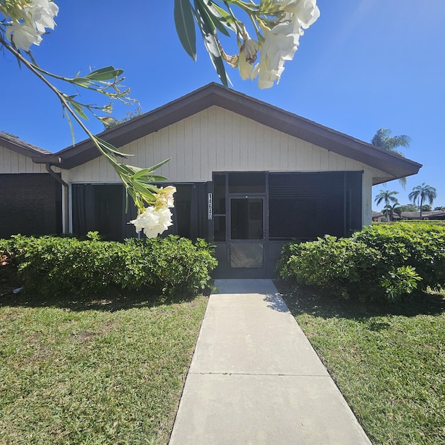 exterior space featuring a front lawn