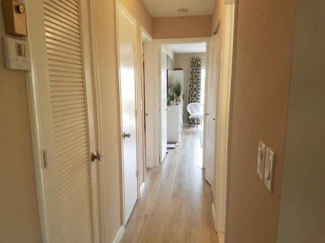 14640 Candy Way, Delray Beach, FL 33484 - hallway featuring light wood-style flooring