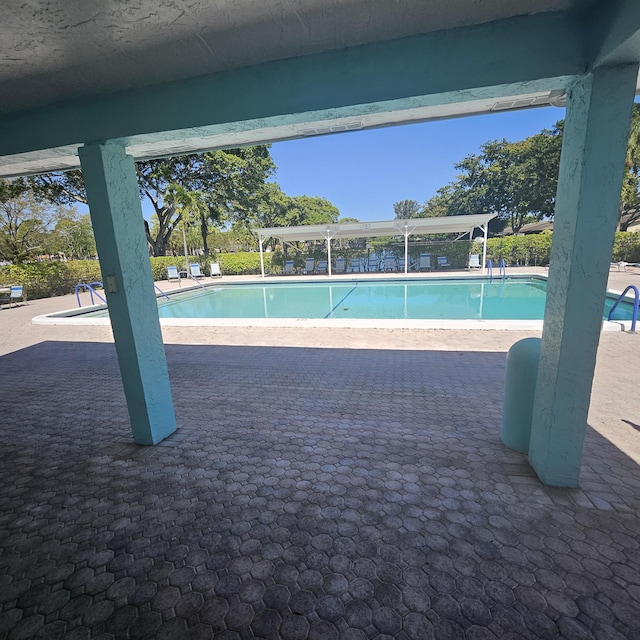 14640 Candy Way, Delray Beach, FL 33484 - community pool with a patio and a pergola