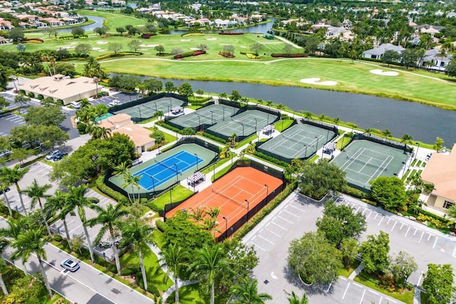 birds eye view of property featuring a water view