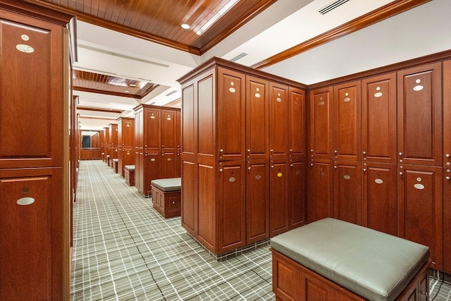 interior space featuring wood ceiling and ornamental molding