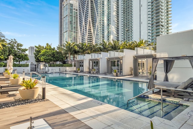 view of pool featuring a patio