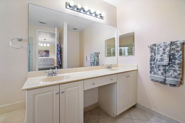 bathroom featuring vanity and tile patterned floors