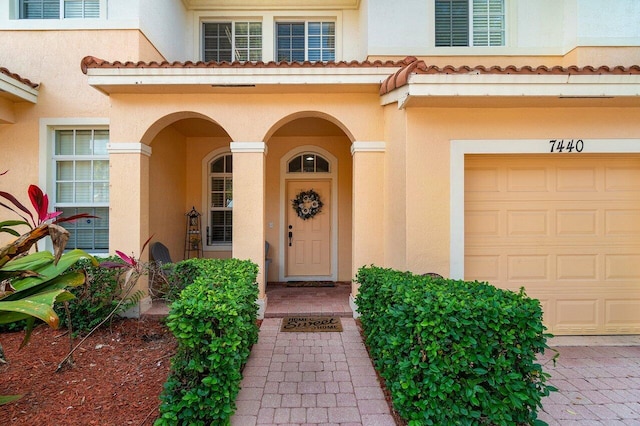 entrance to property with a garage