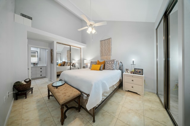 bedroom with ceiling fan, high vaulted ceiling, and light tile patterned floors