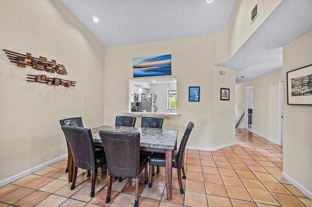 view of tiled dining area