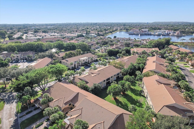 drone / aerial view with a water view