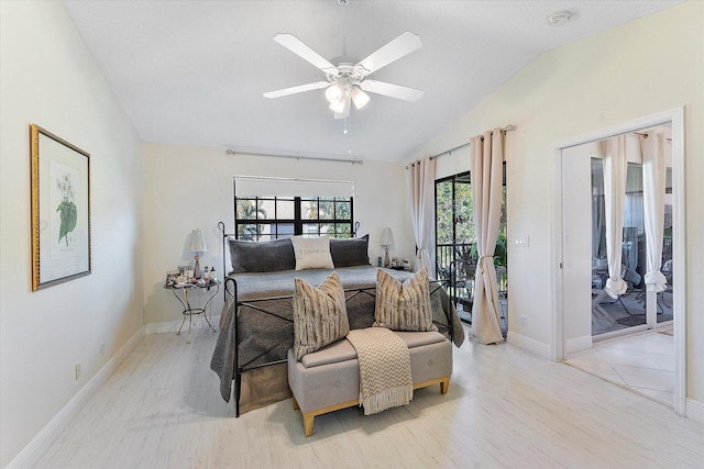 bedroom featuring lofted ceiling, access to exterior, light hardwood / wood-style floors, and ceiling fan