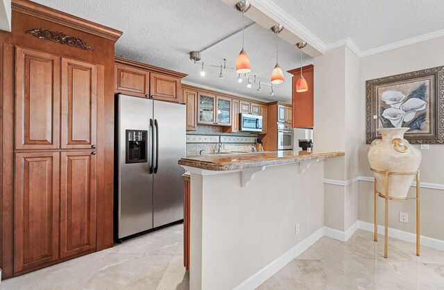 laundry room featuring stacked washer and dryer