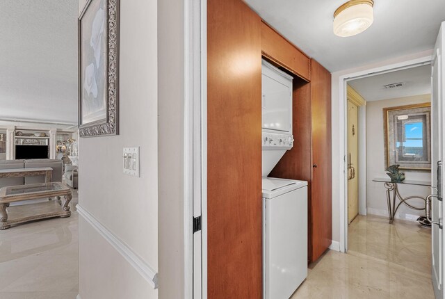 tiled bedroom featuring a closet and a textured ceiling