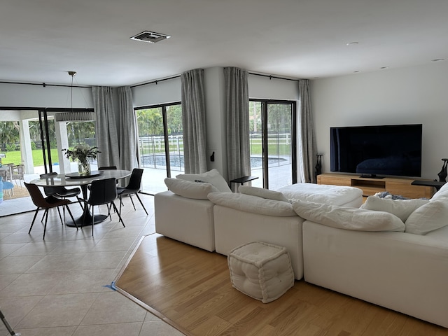 living room featuring light tile patterned floors