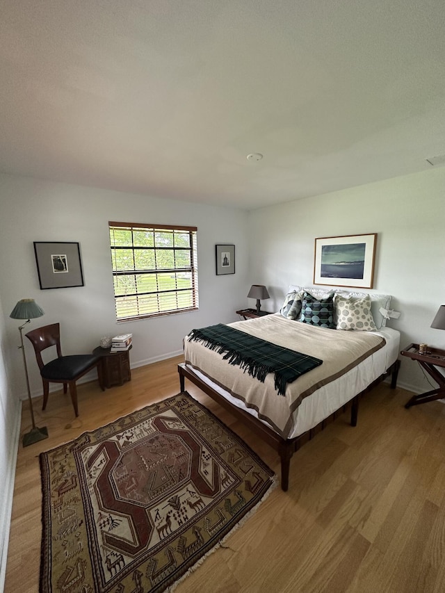 bedroom featuring light hardwood / wood-style flooring