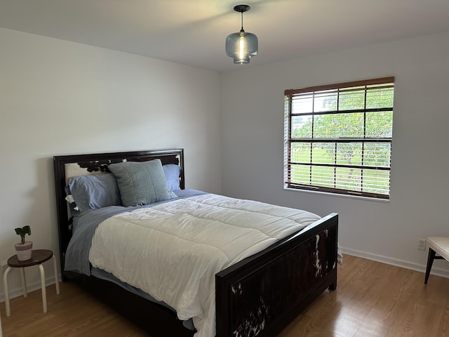 bedroom featuring hardwood / wood-style flooring