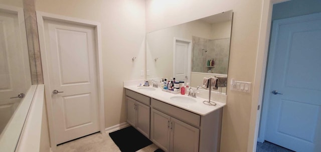 bathroom featuring vanity and a shower